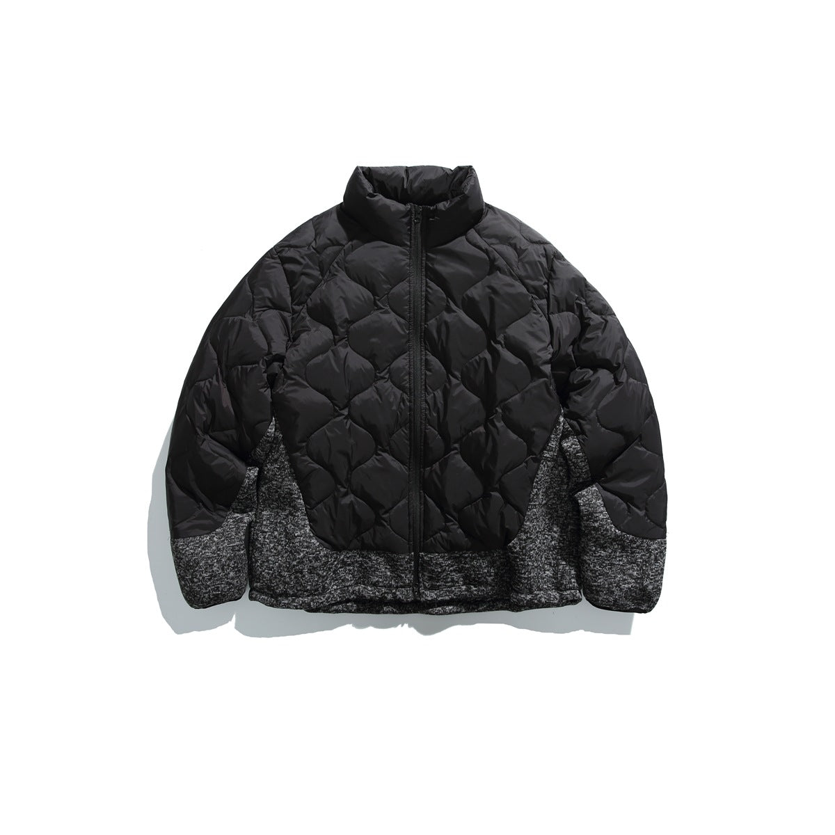 Black quilted stand-collar zip jacket with marled charcoal knit-look side, hem and cuff panels, front view