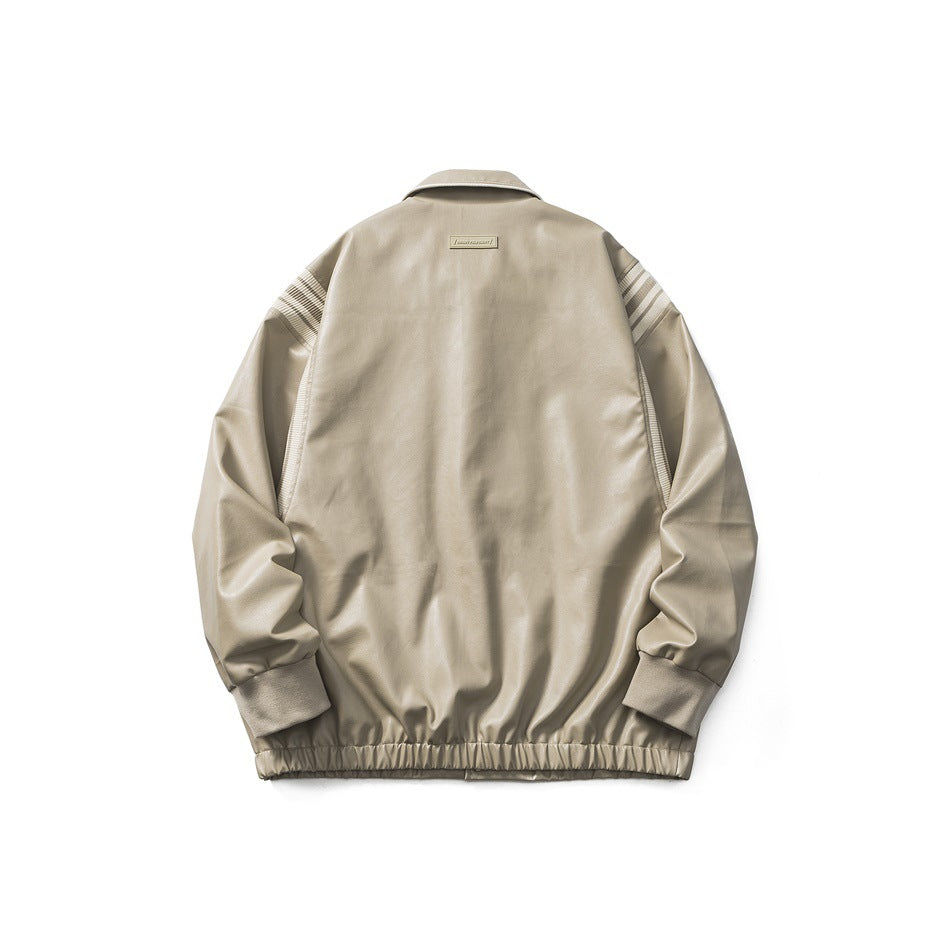 Back view of khaki faux-leather jacket with ribbed shoulder panels, small patch below the collar, ribbed cuffs and elastic