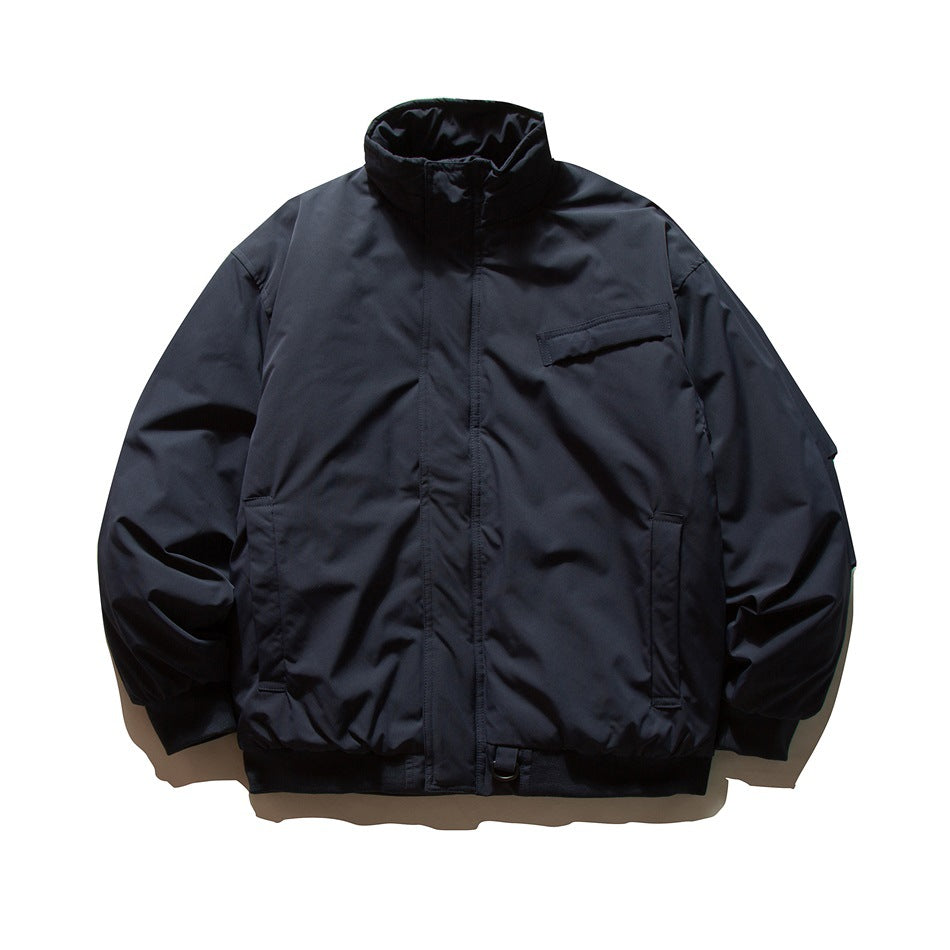 Navy blue padded-look bomber jacket with stand collar, chest flap pocket and ribbed cuffs, flat lay front view