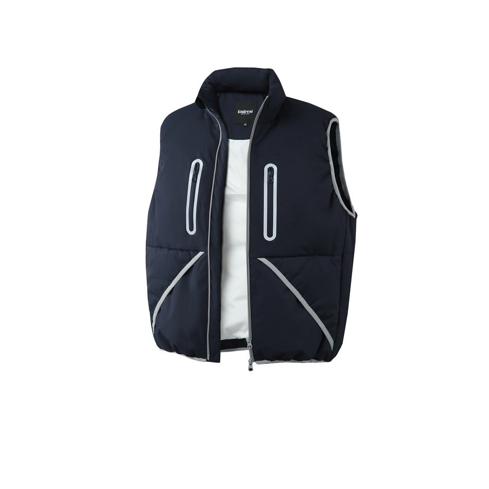 Navy sleeveless puffer vest with a high collar, front zipper, two vertical chest pockets and contrasting light trim.