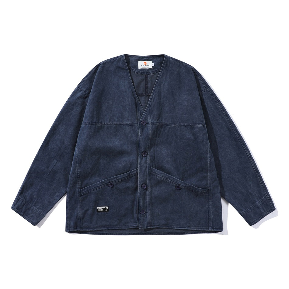 Navy blue washed collarless V-neck button jacket with angled front pockets, flat lay front view