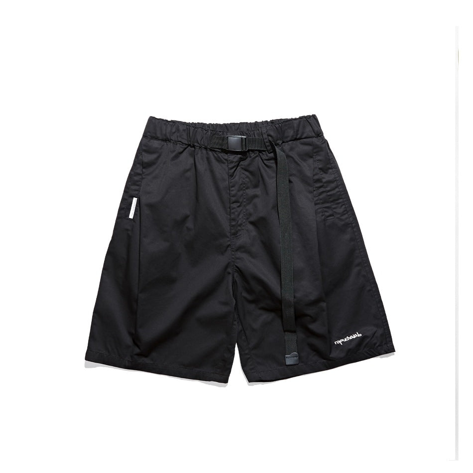 Black knee-length shorts with elastic waist, black webbing belt and buckle, front view on white background