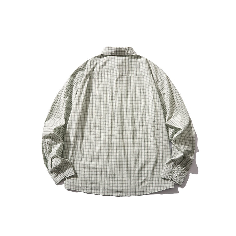 Back view of a pale green and gray plaid long-sleeve button-up shirt laid flat.