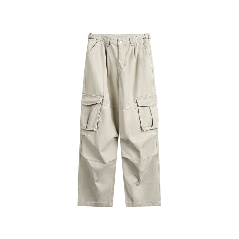 Light khaki wide-leg cargo pants, front view, with flap cargo pockets and side waist buckle tabs