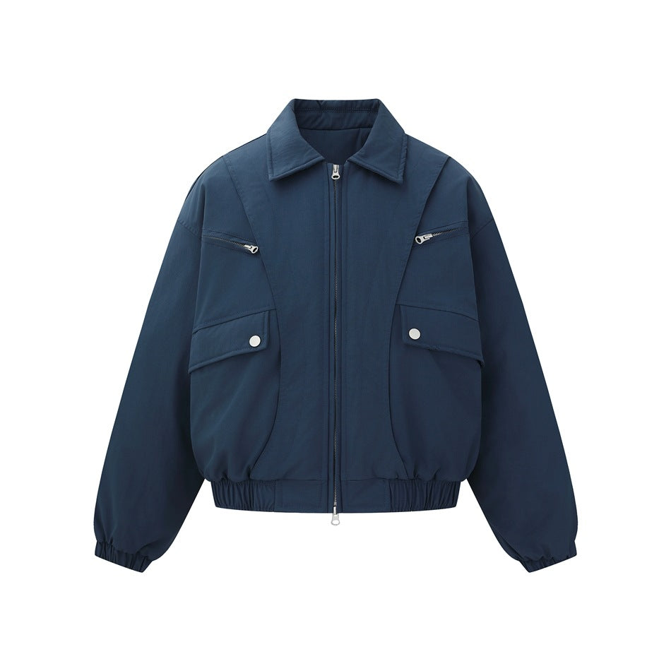 Gray-blue padded bomber jacket flat front view with collar, zip front, chest zip pockets and snap flap pockets
