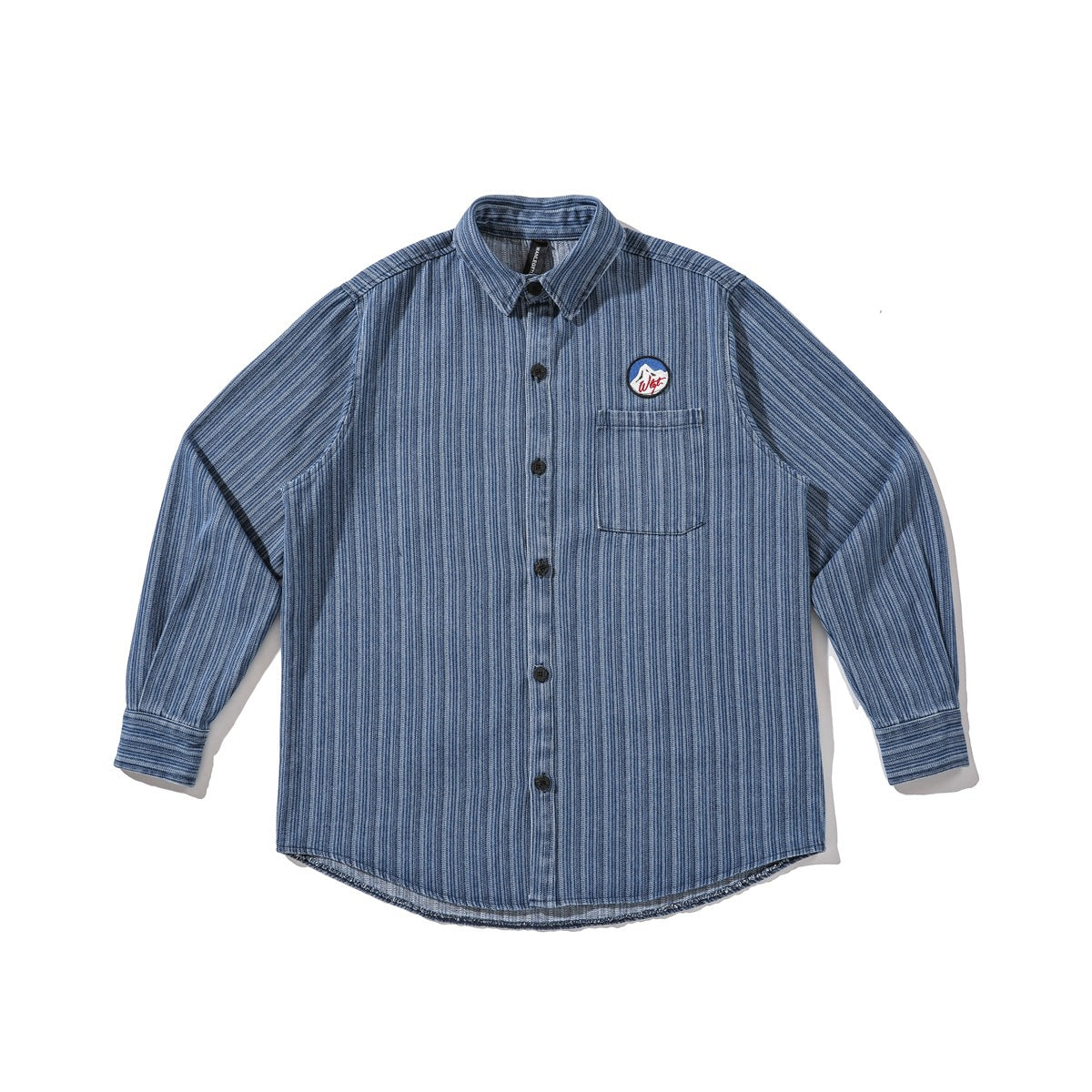Washed blue vertical-stripe long-sleeve button-up shirt with chest pocket and round mountain patch, flat lay front view