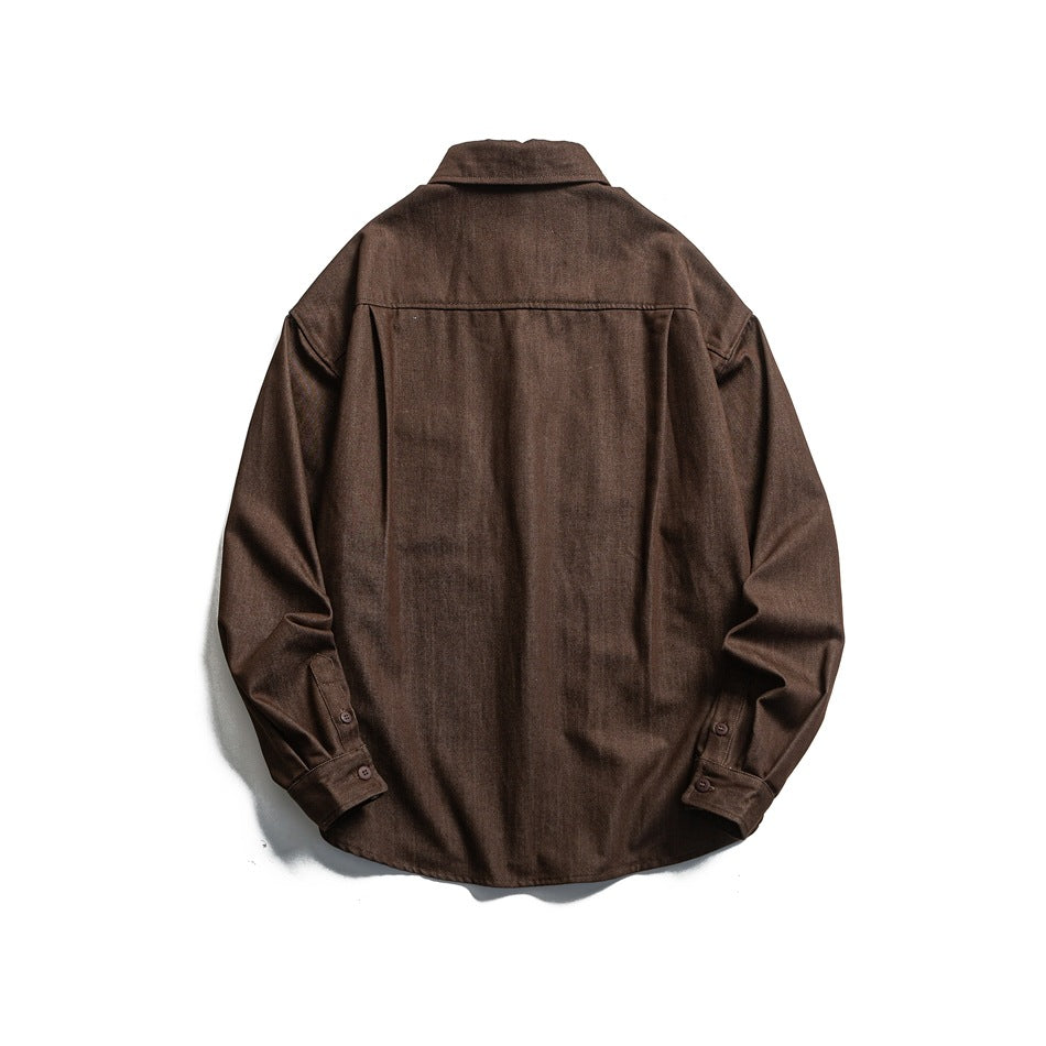Brown long-sleeve shirt back view showing yoke seam, center pleat and buttoned cuffs, flat lay