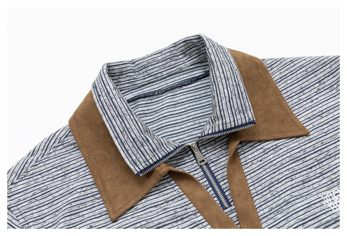 Close-up of the striped top’s collar, tan lapels, and silver front zipper.