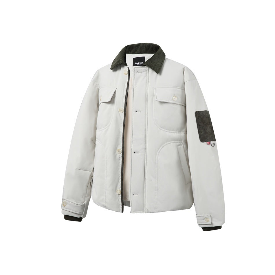 Ivory white padded jacket with dark olive ribbed collar, flap chest pockets, buttons and olive sleeve patch, front view