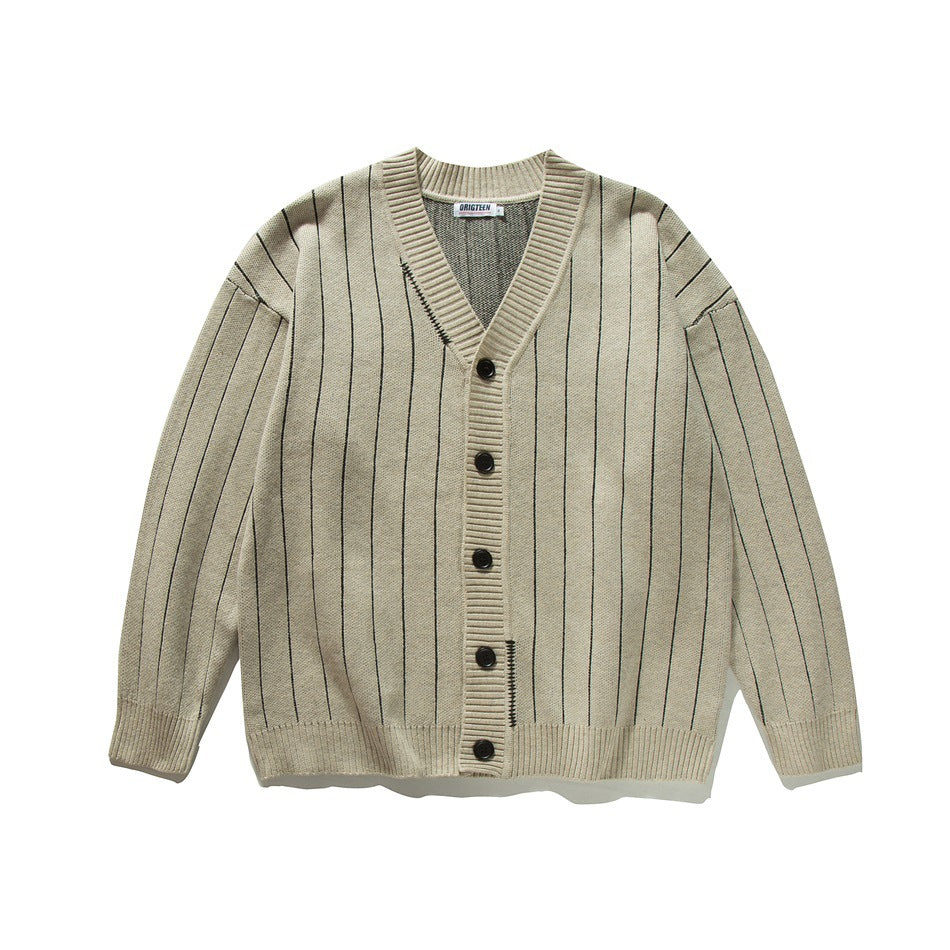 Beige knit cardigan with dark pinstripes, V-neck, ribbed trim and five dark buttons, flat lay front view