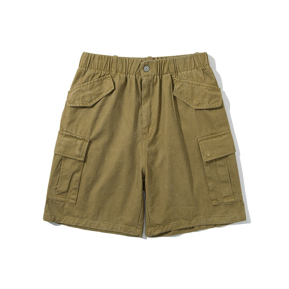 Khaki washed cargo shorts flat lay with elastic waistband, flap pockets and side cargo pockets