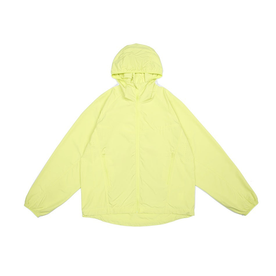 Light yellow hooded zip-up jacket laid flat, front view with zippered side pockets and elastic cuffs