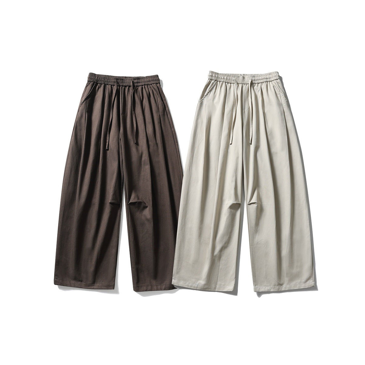 Front view of wide-leg pants in dark brown and light beige, each with an elastic drawstring waist and side pockets.