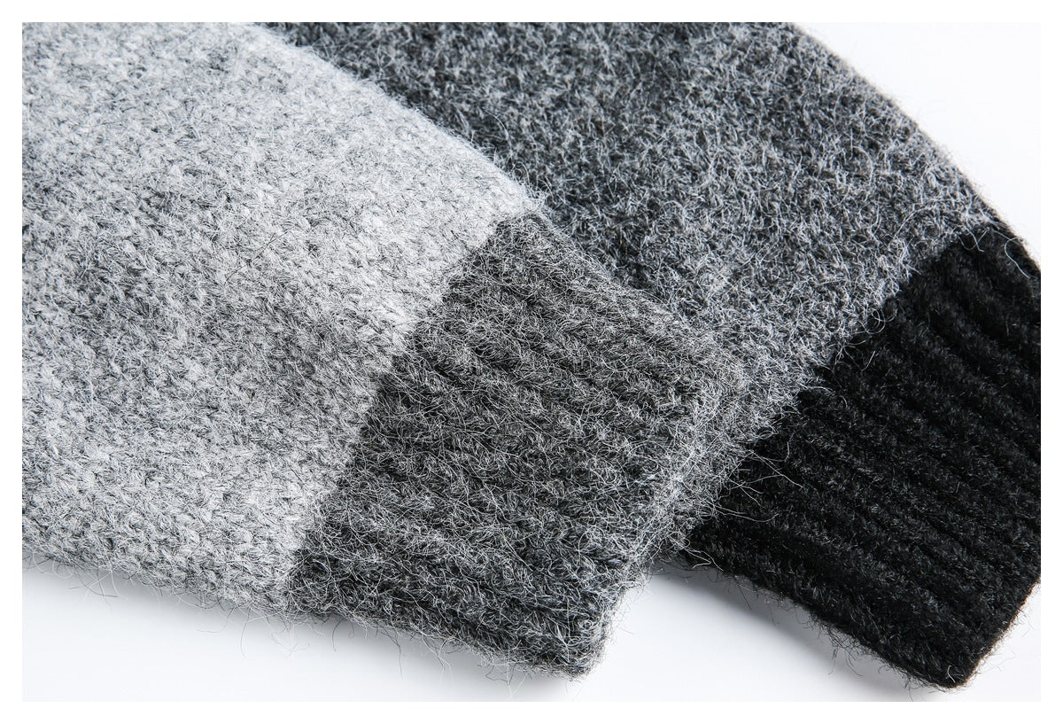 Close-up showing the cardigan's fuzzy knit texture and transition from gray to charcoal and black sections.