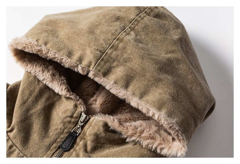 Close-up of the brown jacket's hood, trimmed and lined with plush beige faux fur.