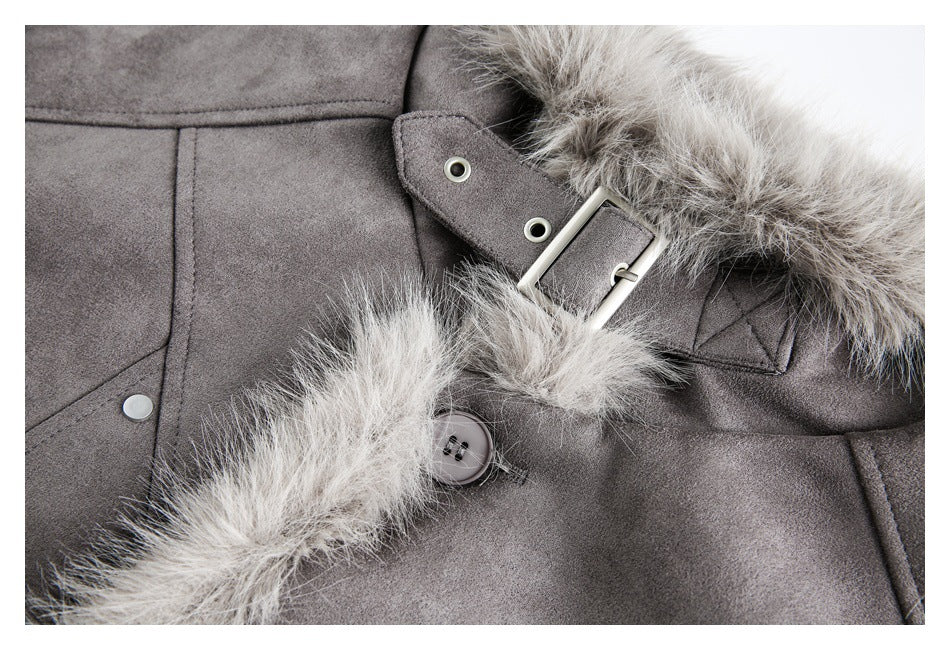 Close-up of a gray coat's fur-trimmed front fastening, buckle strap, and button.