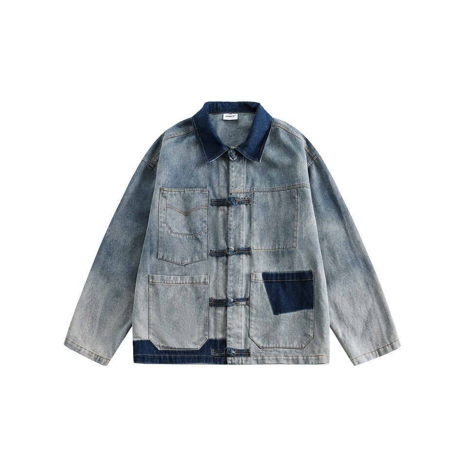 Washed blue denim jacket flat lay with dark indigo collar, knotted frog closures and patch pockets