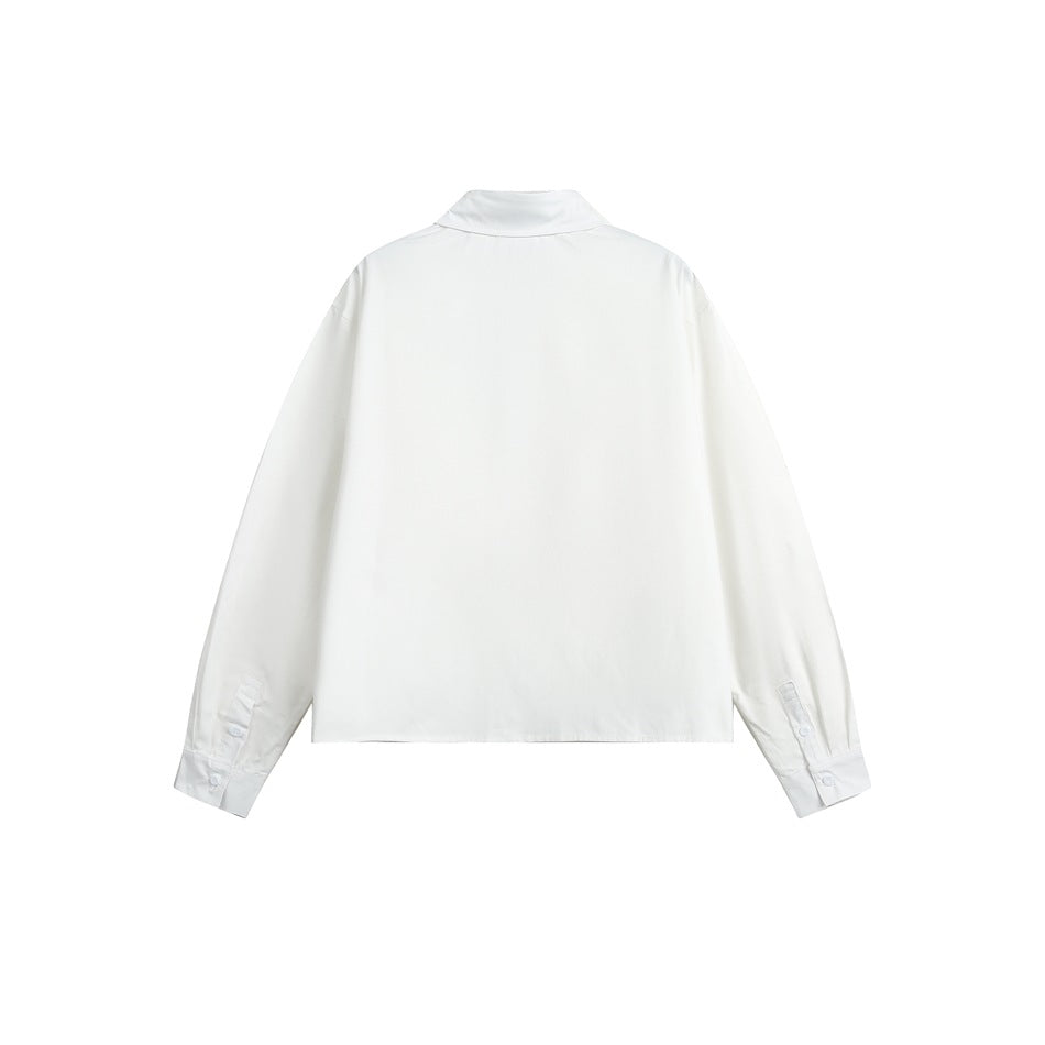Back view of a white long-sleeve collared shirt with button cuffs, isolated on a white background.