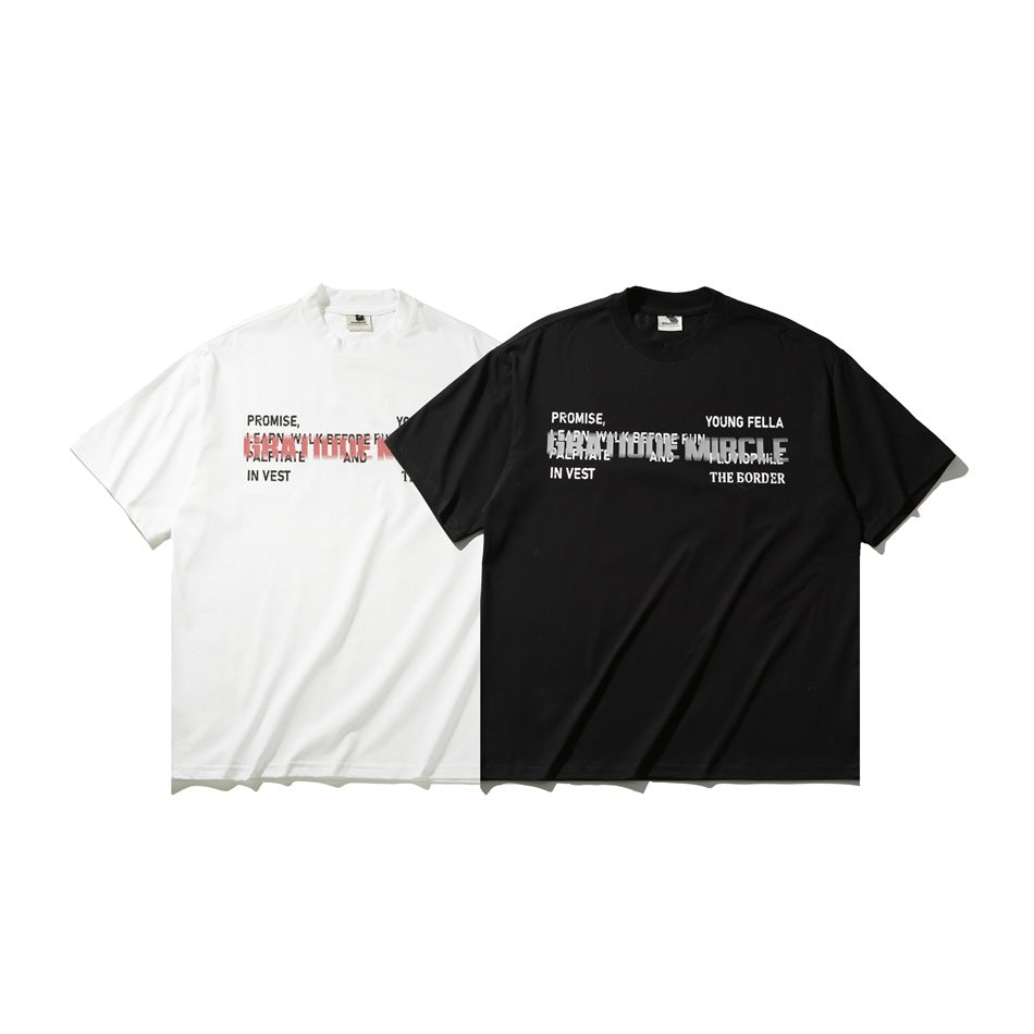 White and black short-sleeve crew-neck graphic T-shirts displayed side by side, front view.