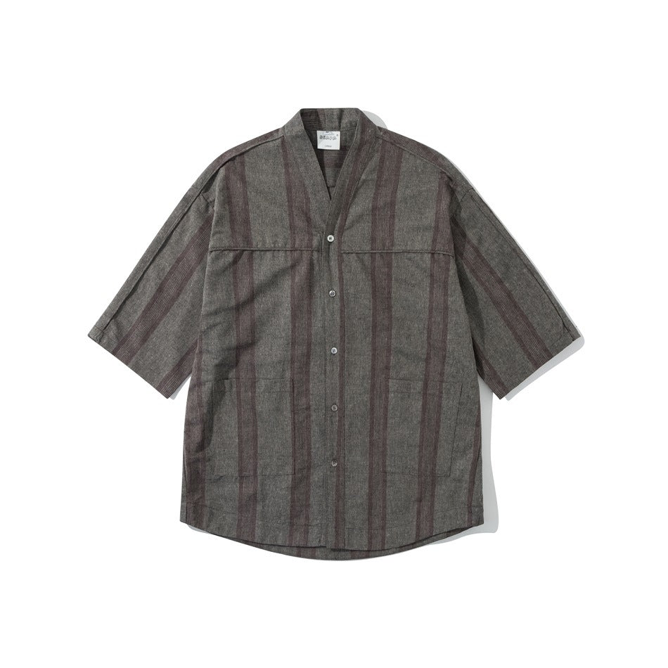 Brown-gray short-sleeve shirt with burgundy vertical stripes, V-neck and button front, laid flat