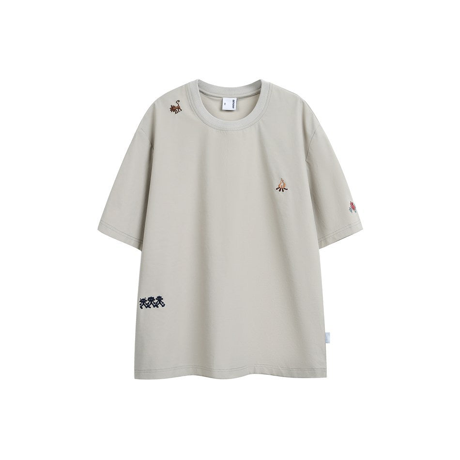 Light beige short-sleeve crew-neck T-shirt with small embroidered animal, campfire, flower and figure motifs, front view