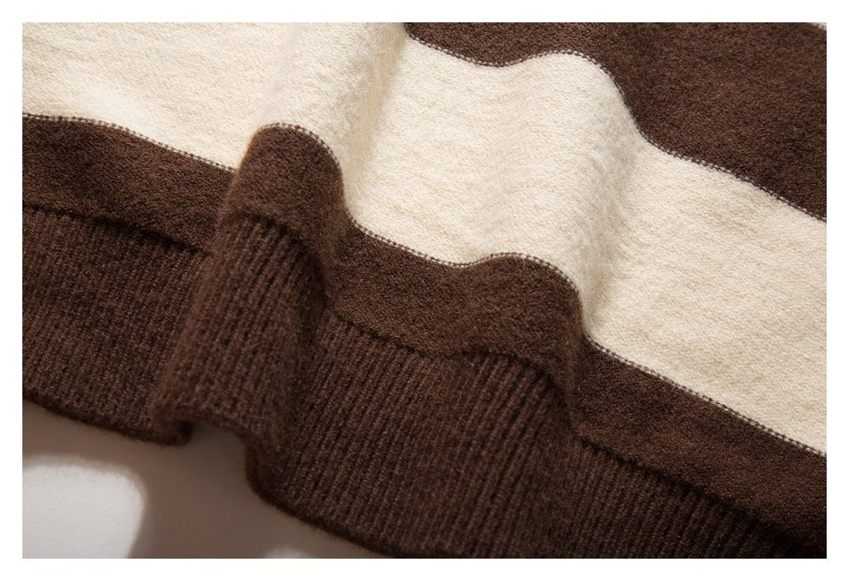 Close-up of a dark brown ribbed knit cuff beside cream and brown stripes.