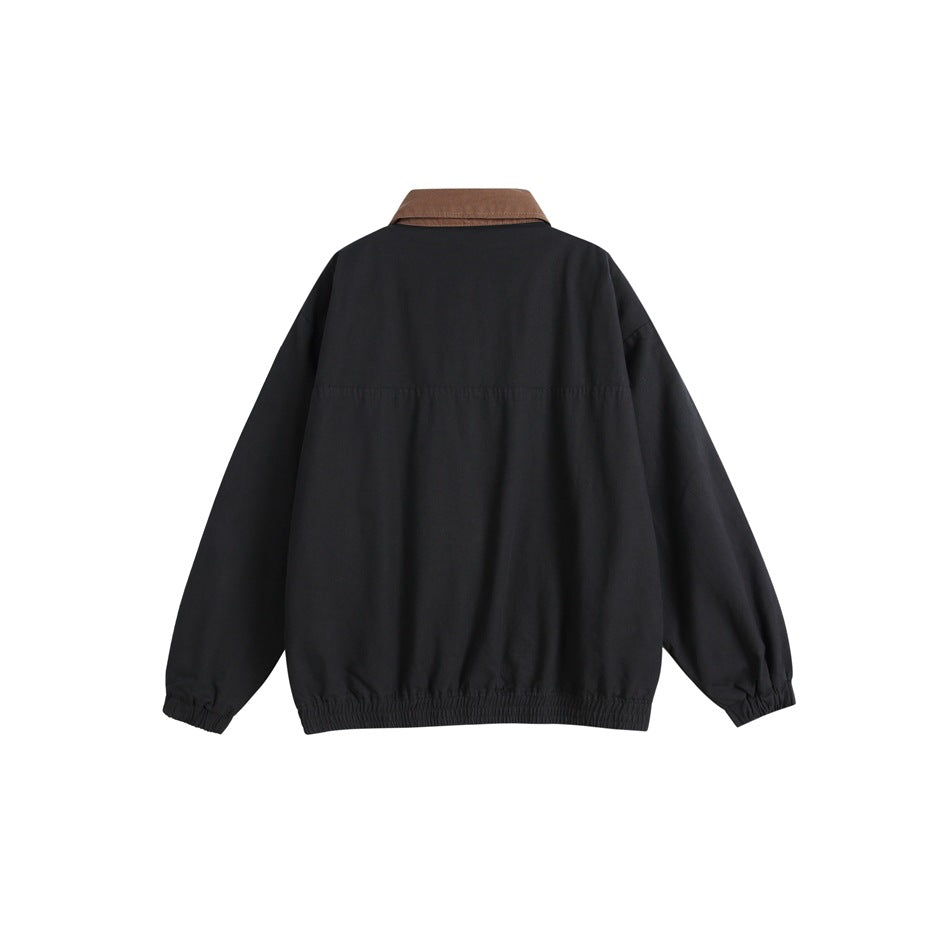 Back view of a black jacket with a brown collar, long sleeves, and elastic cuffs and hem.