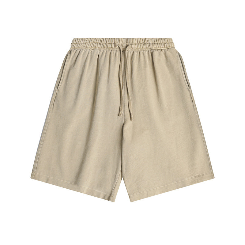 Khaki knee-length drawstring shorts with elastic waistband and side pockets, flat lay front view