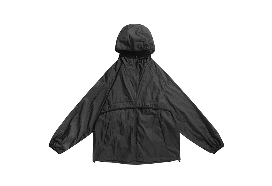 Black lightweight hooded zip jacket flat lay, front view, with hem drawcord toggles and gathered cuffs