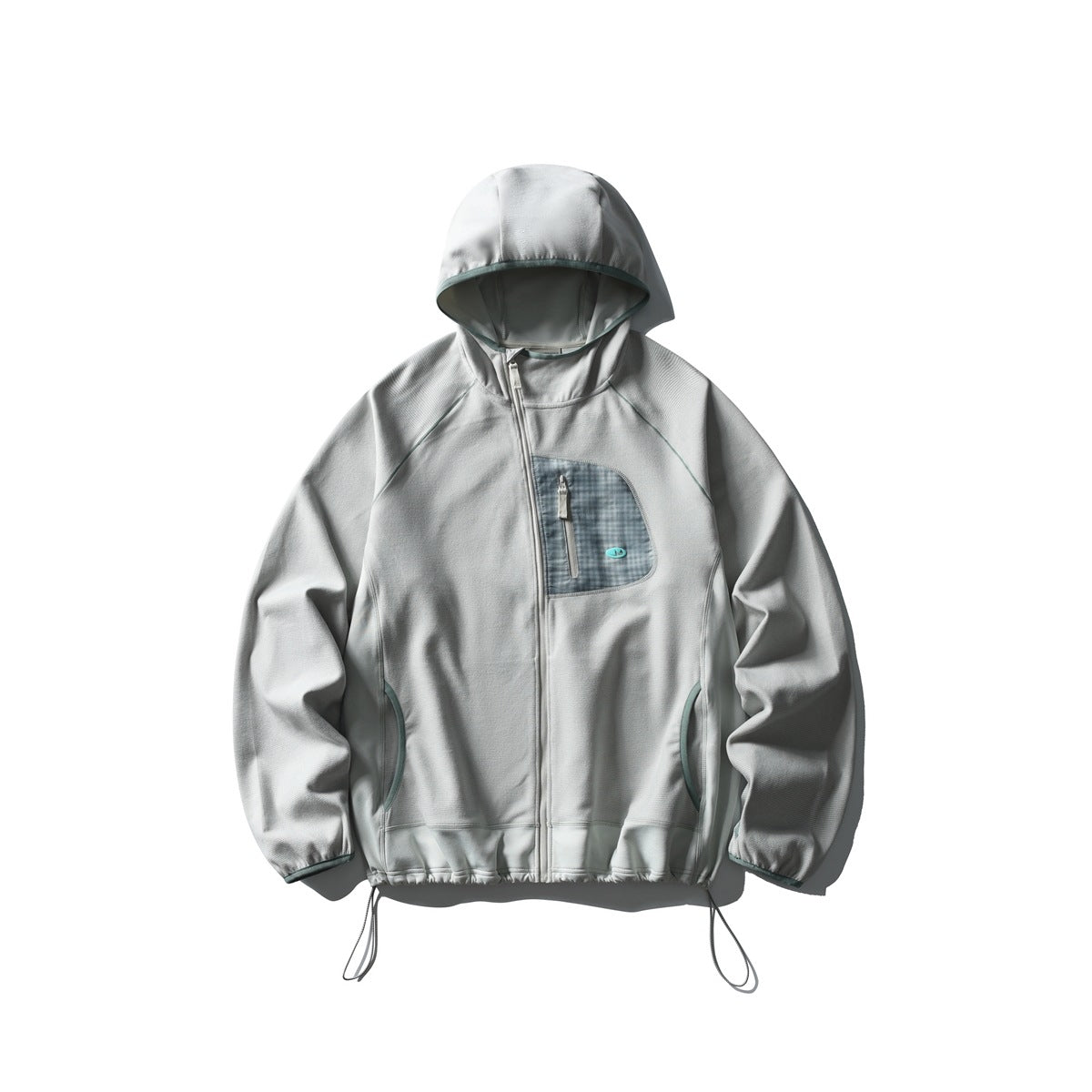 Light gray hooded zip jacket flat lay with plaid chest pocket and drawcord hem