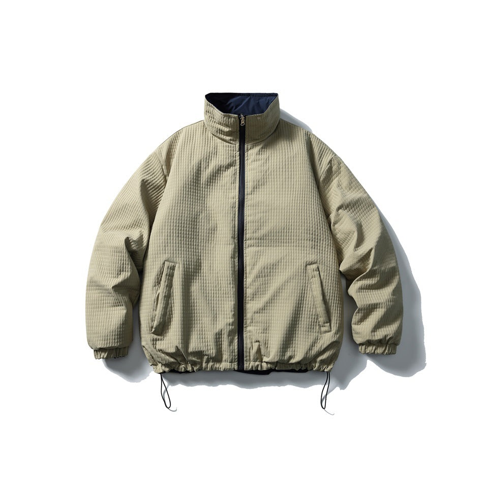 Khaki waffle-texture stand-collar zip jacket with angled pockets, elastic cuffs and drawcord hem, flat lay front view