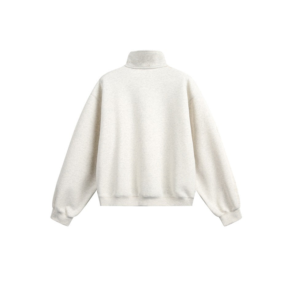 Back view of a light heather sweatshirt with a raised collar, dropped shoulders, long sleeves, and ribbed cuffs and hem.