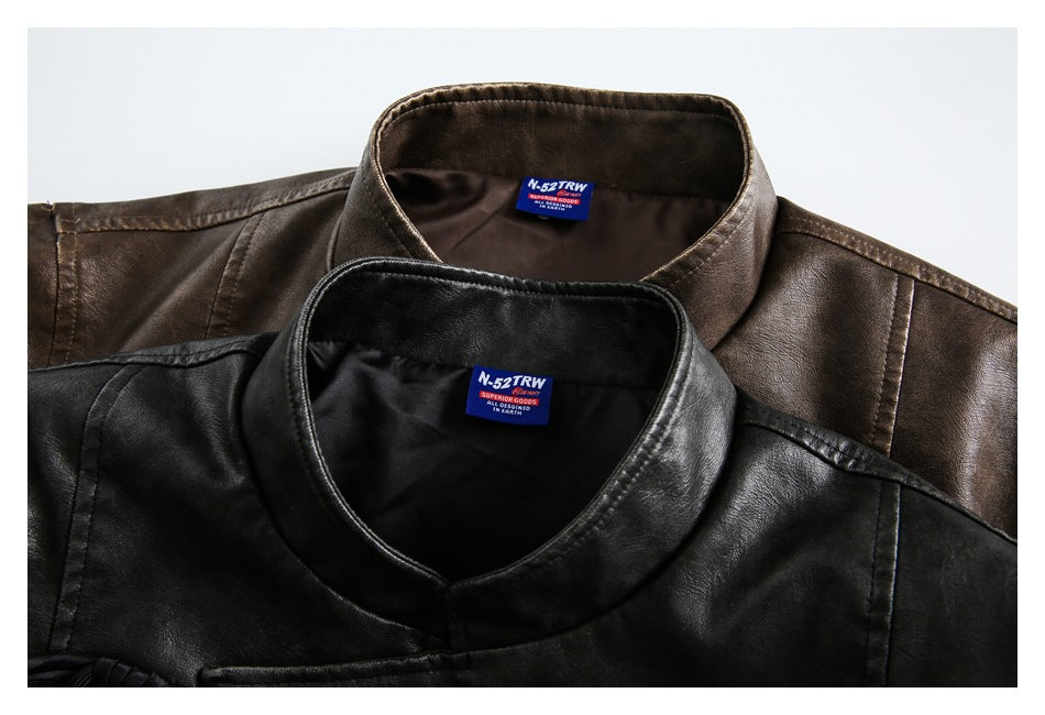 Close-up of black and brown jackets showing their stand collars and sewn-in neck labels.