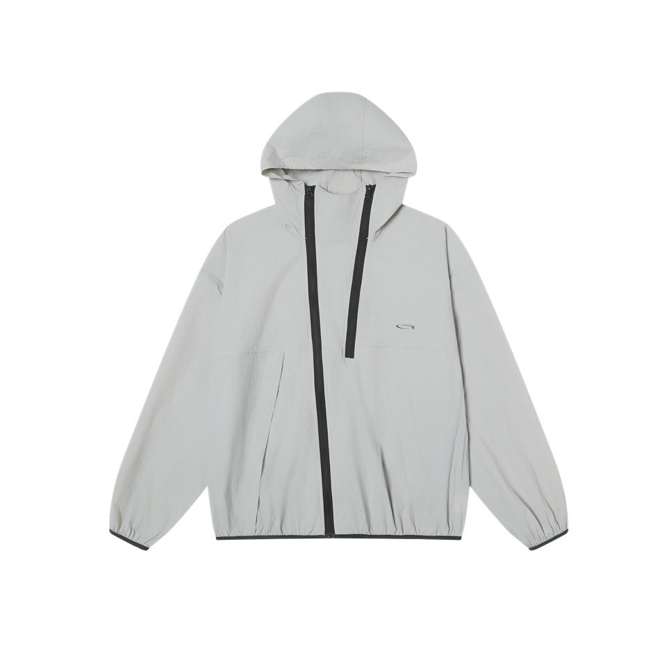 Front view of a light gray hooded jacket with two long black zippers and elasticized cuffs.