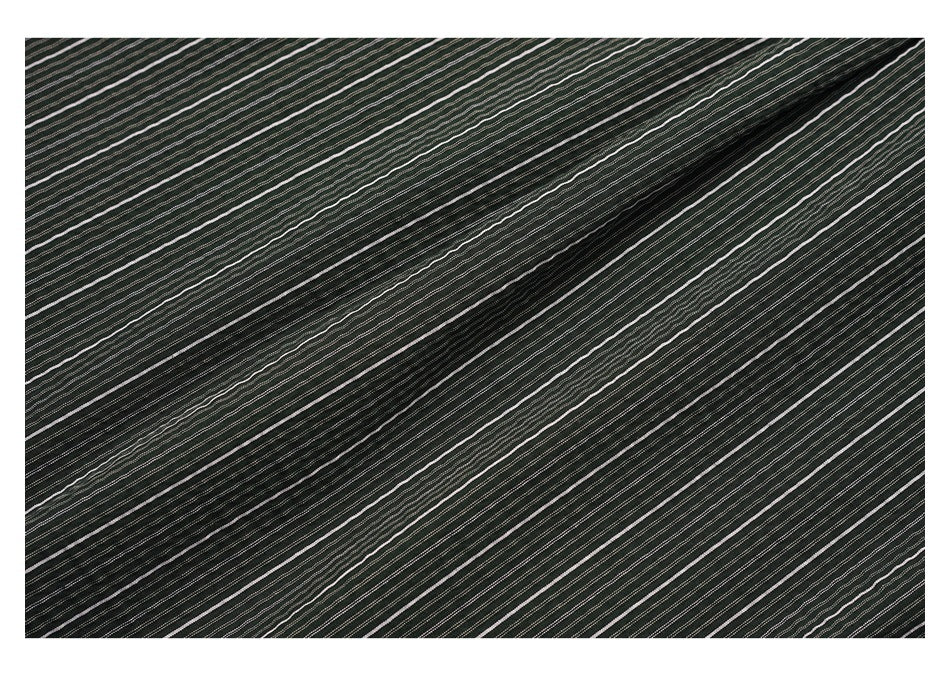 Close-up of dark striped fabric with a long diagonal fold and narrow white lines.