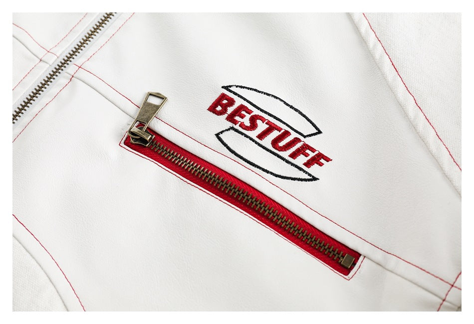 Close-up of red BESTUFF embroidery, a red zip pocket, and contrast stitching on the off-white jacket.