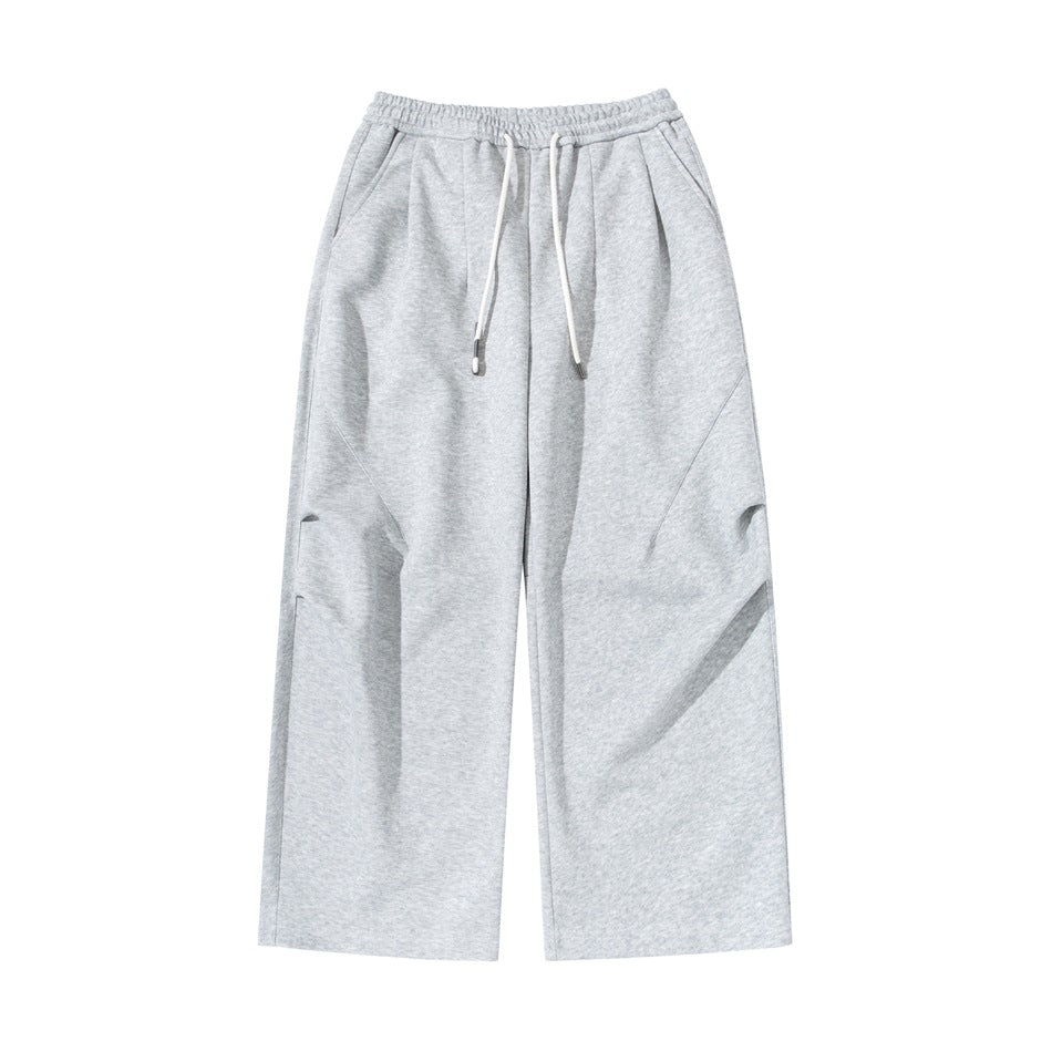 Heather gray wide-leg drawstring pants with elastic waist, front pleats and side pockets, flat front view