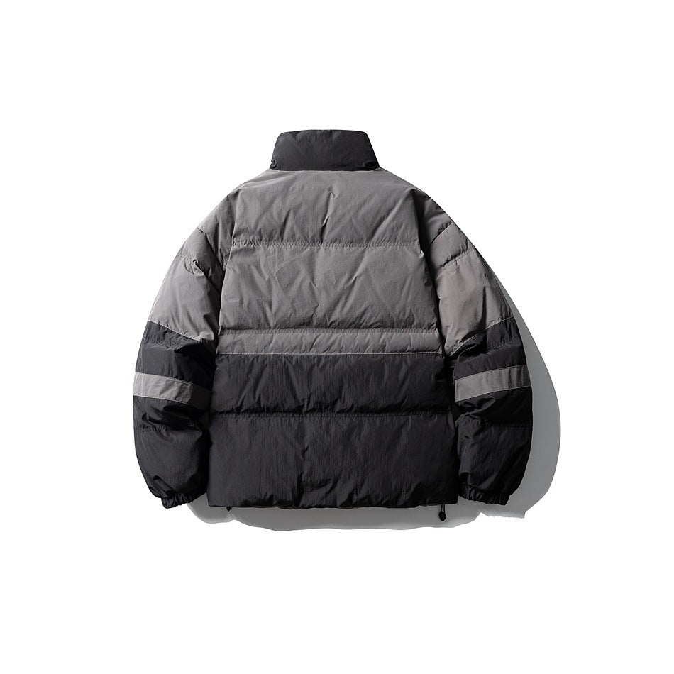 Back view of a gray and black color-block puffer jacket with a high collar and elastic cuffs.