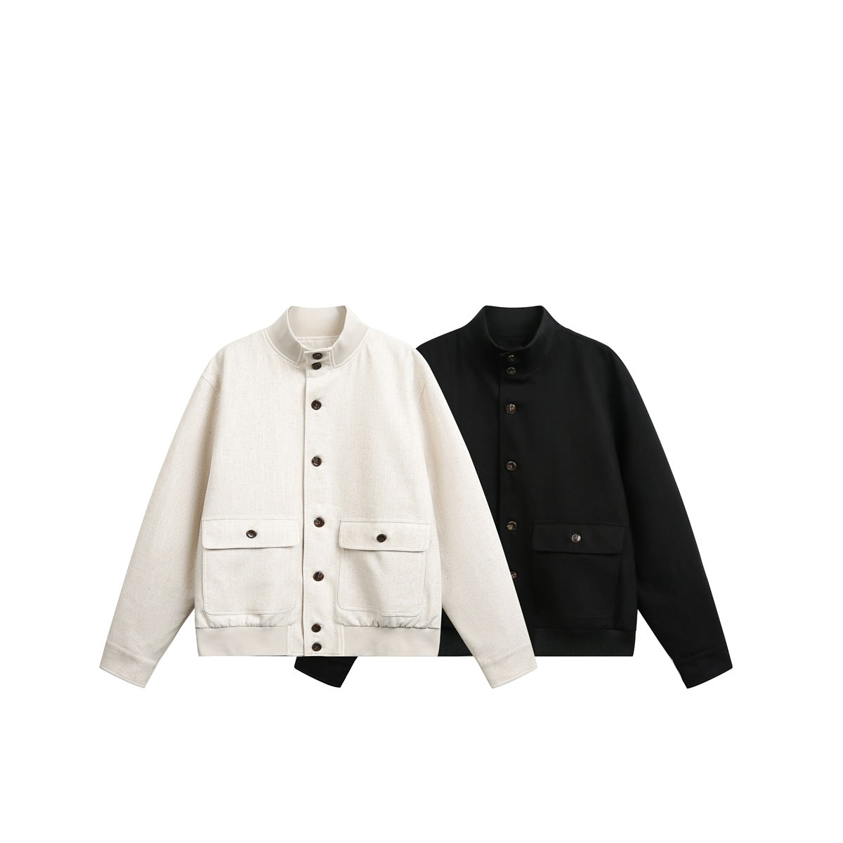 Cream and black stand-collar jackets with button fronts, long sleeves, and two flap pockets.