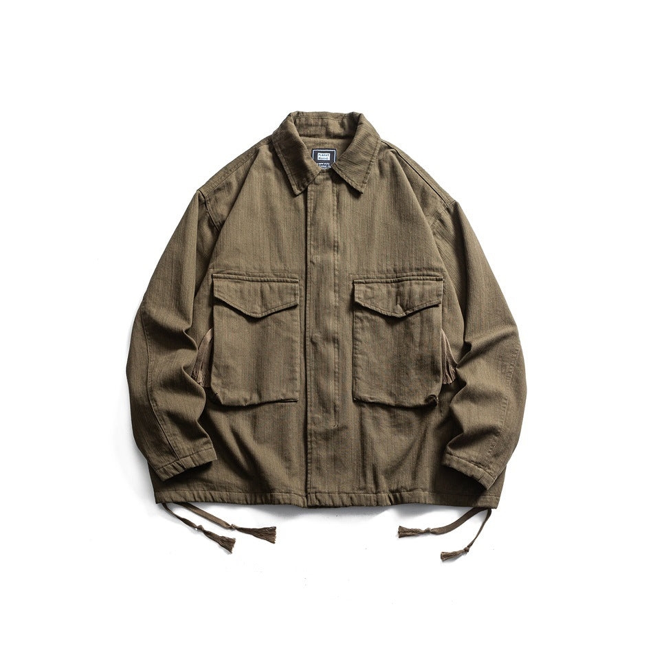 Olive green collared jacket flat lay with two large flap chest pockets and tasseled hem drawcords