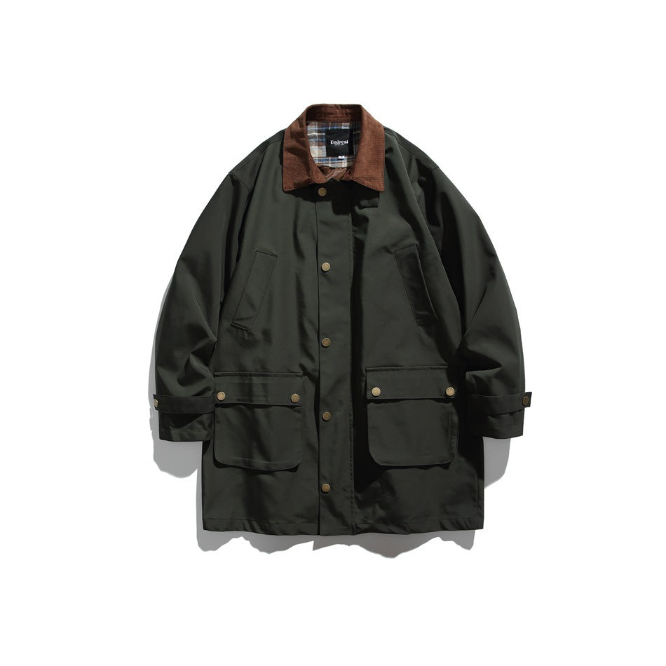 Army green mid-length jacket flat lay with brown collar, plaid collar underside, button front and two flap pockets
