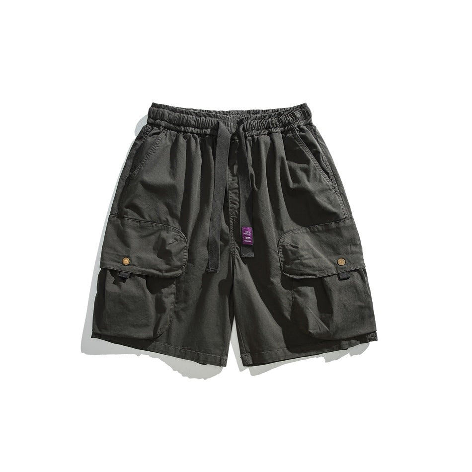 Dark gray-green cargo shorts flat lay with drawstring waist and snap flap cargo pockets