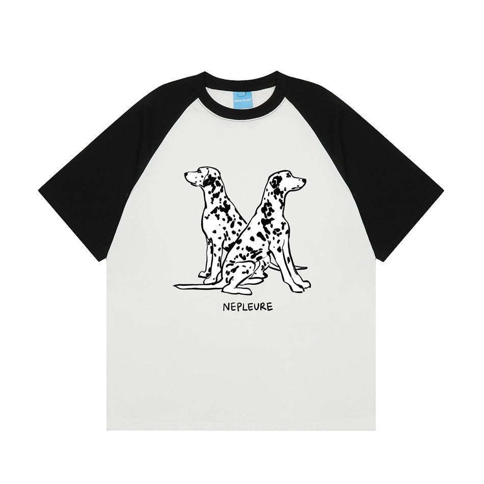 White raglan T-shirt with black sleeves and a front print of two seated Dalmatian dogs