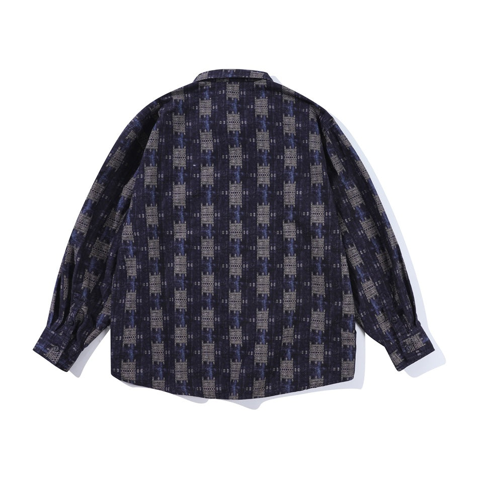 Back view of blue long-sleeve shirt with all-over geometric gray-beige print and buttoned cuffs, flat lay
