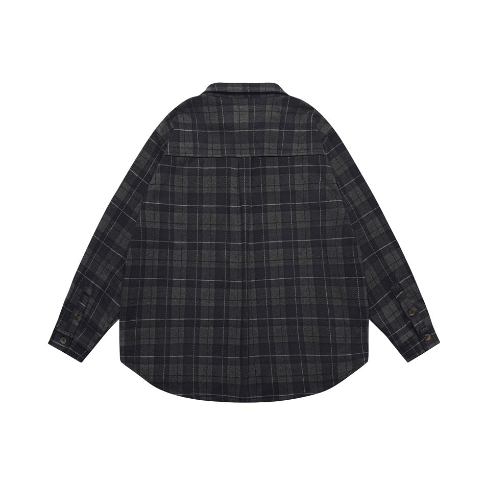 Back view of a charcoal and black plaid button-up shirt with long sleeves and a curved hem, laid flat on white.