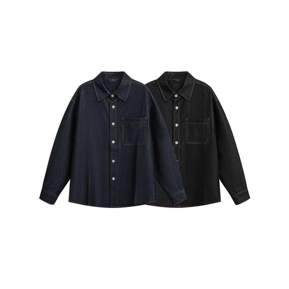 Two long-sleeve button-front denim shirts in dark indigo and black, each with a pointed collar and chest pocket.