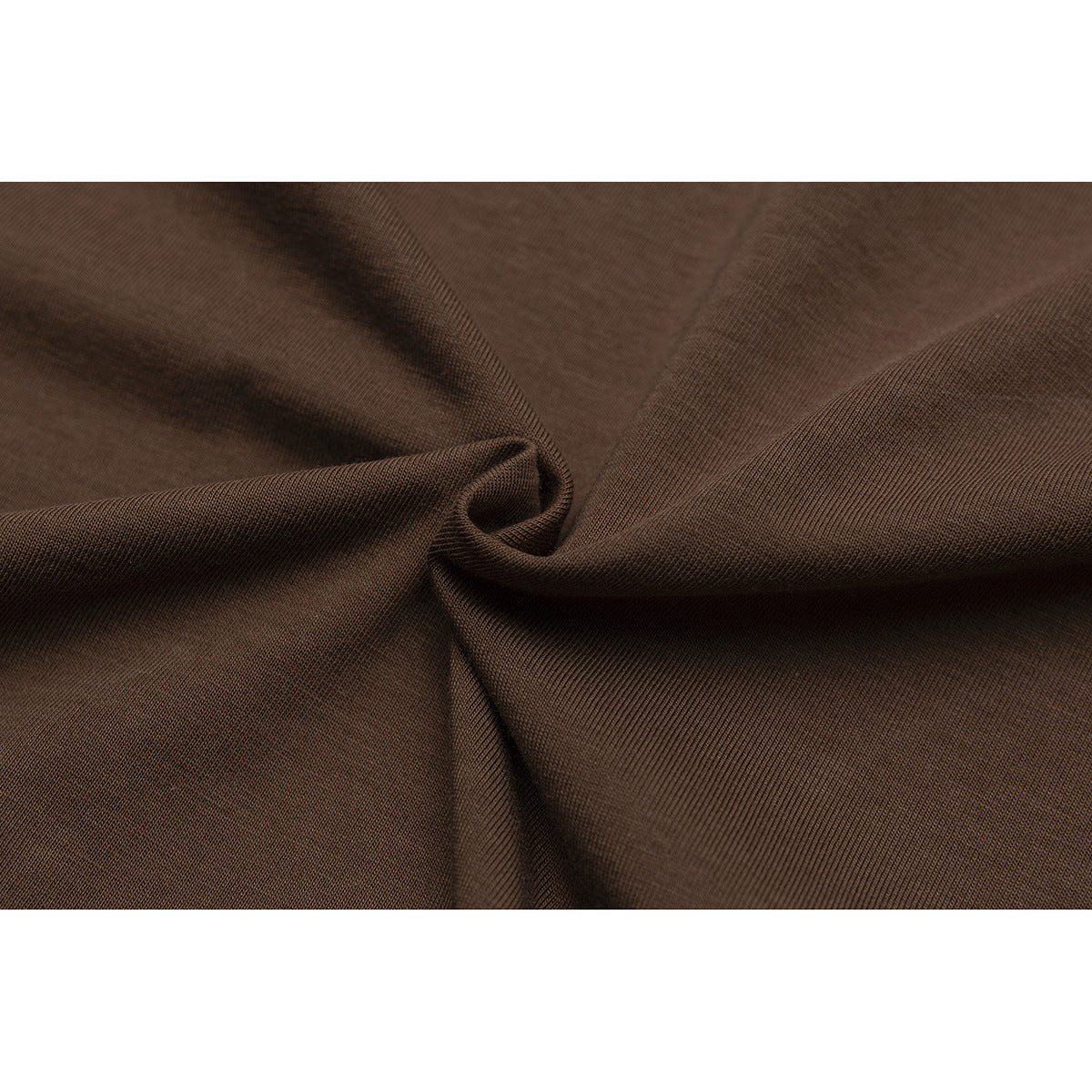 Close-up of brown fabric gathered to show its fine knit texture and drape.