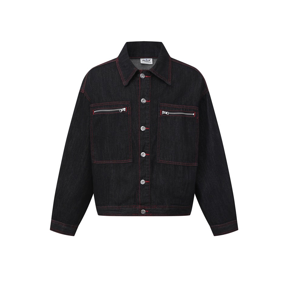 Black washed denim jacket with red topstitching, front buttons and two zippered chest pockets, flat front view