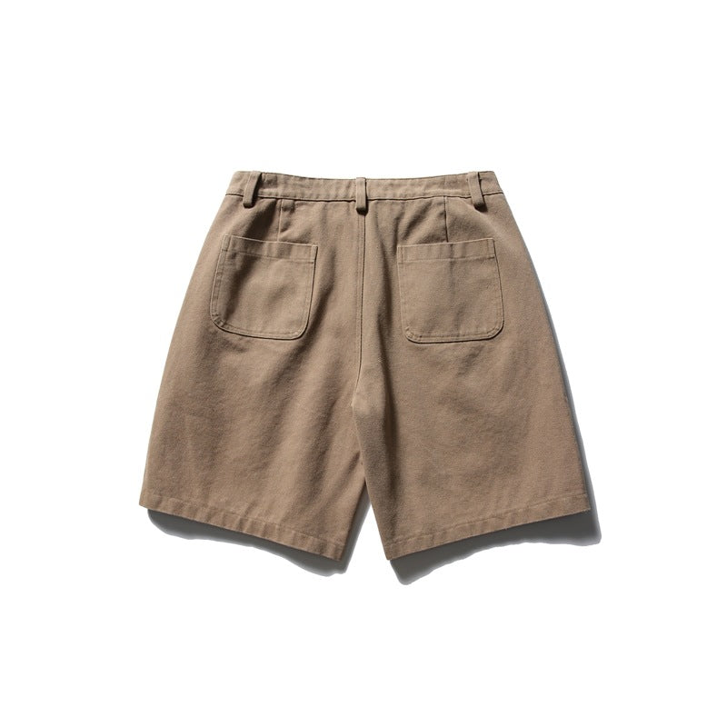 Flat rear view of tan shorts with two patch pockets and belt loops.