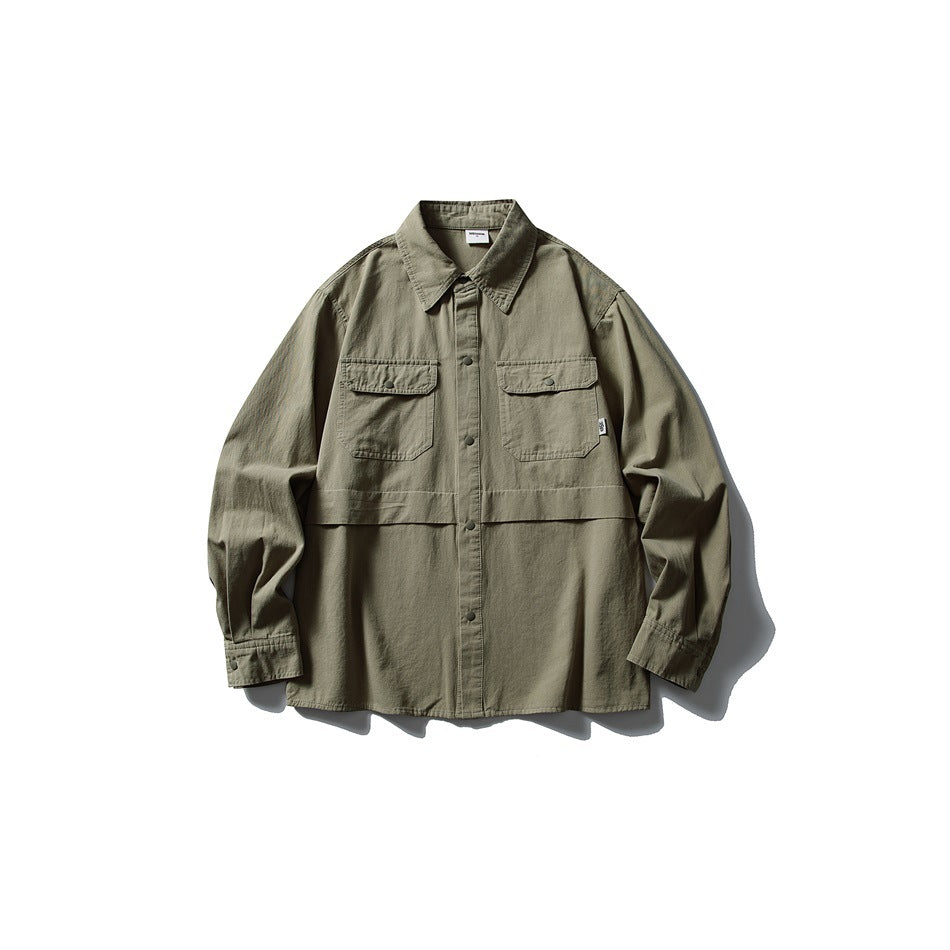 Olive green long-sleeve button-front shirt with two chest flap pockets, laid flat, front view
